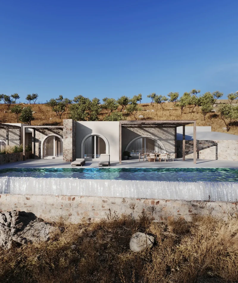 Καθιστικό–τραπεζαρία εξωτερικού χώρου κάτω από ξύλινη pergola, με φόντο τη θάλασσα και αυλή οριοθετημένη από πέτρινο τοιχίο.