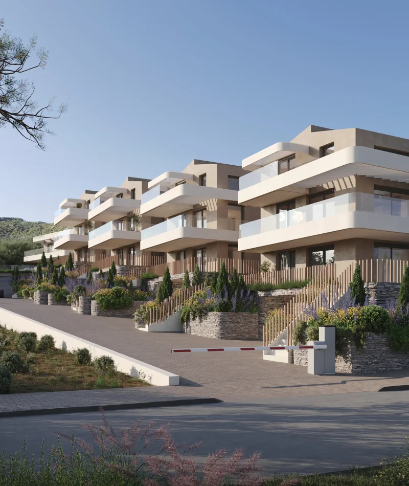 Street-level view of Porto Palio Residences with layered balconies, stone terraces, and landscaped entrance.