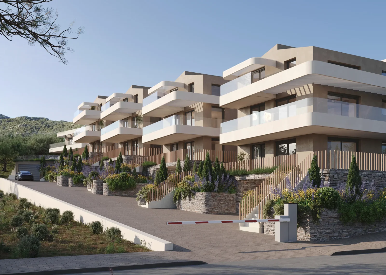 Street-level view of Porto Palio Residences with layered balconies, stone terraces, and landscaped entrance.